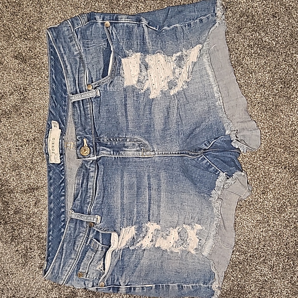 Distressed denim shorts